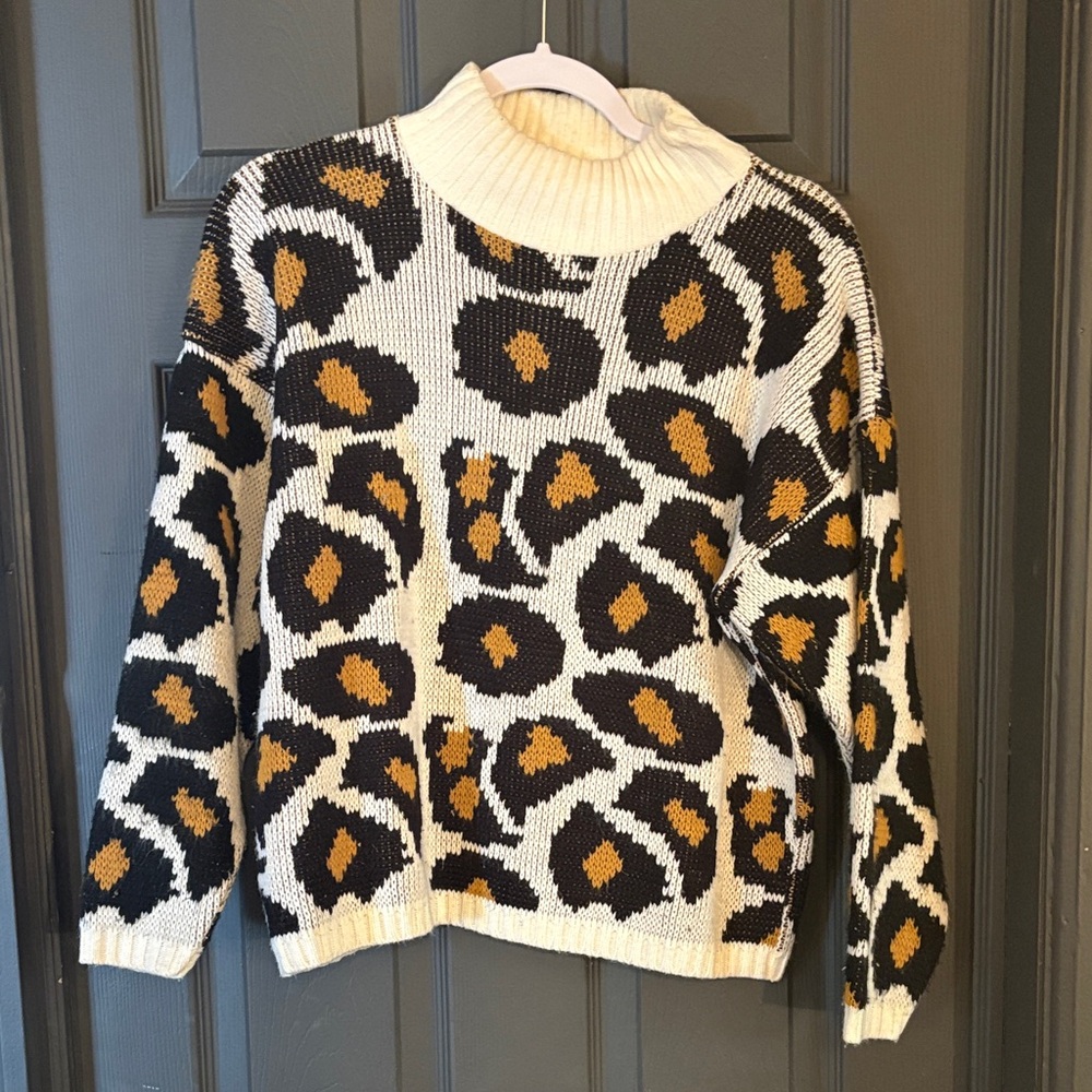 Chic Leopard Print Turtleneck Sweater - Black, Brown, and Cream